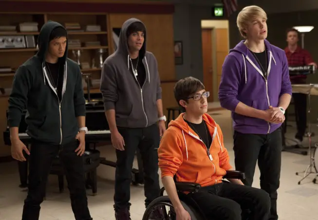 GLEE: Sam (Chord Overstreet,  R) starts a tribute band with Mike (Harry Shum Jr.,  L),  Puck (Mark Salling,  second from L) and Artie (Kevin McHale,  third from L) in the "Comeback" episode of GLEE airing Tuesday,  Feb. 15 (8:00-9:00 PM ET/PT) on FOX. ©2011 Fox Broadcasting Co. CR: Adam Rose/FOX